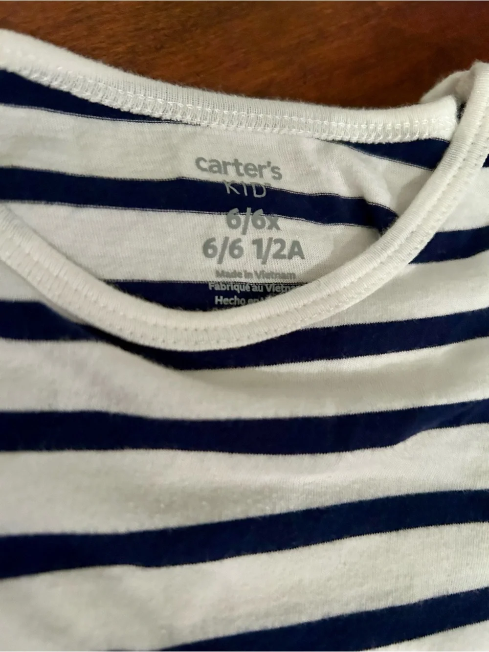 Carters Kid navy and white striped flutter sleeve top (6/6x)